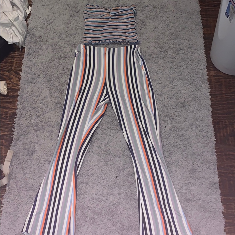 Striped bell bottoms and a strapless crop top